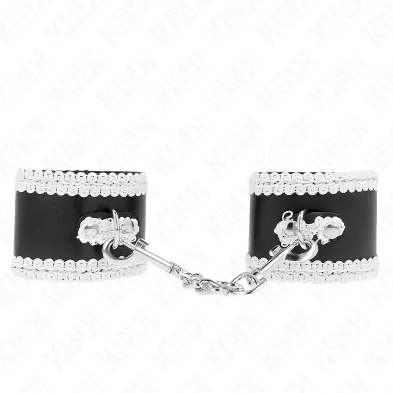 KINK–SCHWARZEHANDGELENKFESSELNMITWEISSERDEKORIERTERSPITZE,VERSTELLBAR20-23CMX5,5CM